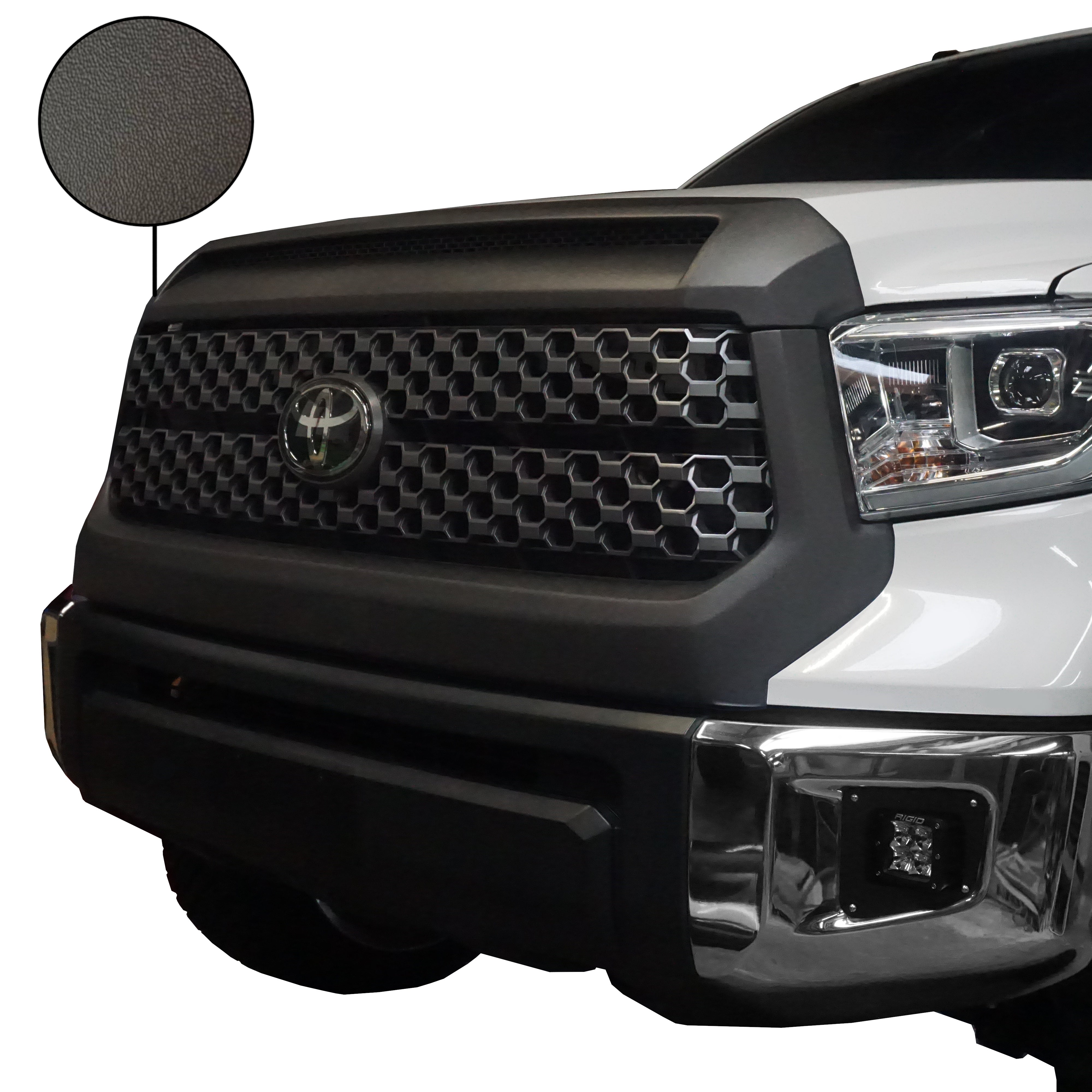 Front and side view at a 45-degree angle of a 2014-2021 Toyota Tundra, showcasing Textured TPO BumperShellz overlays on the grille surround and hood bulge.