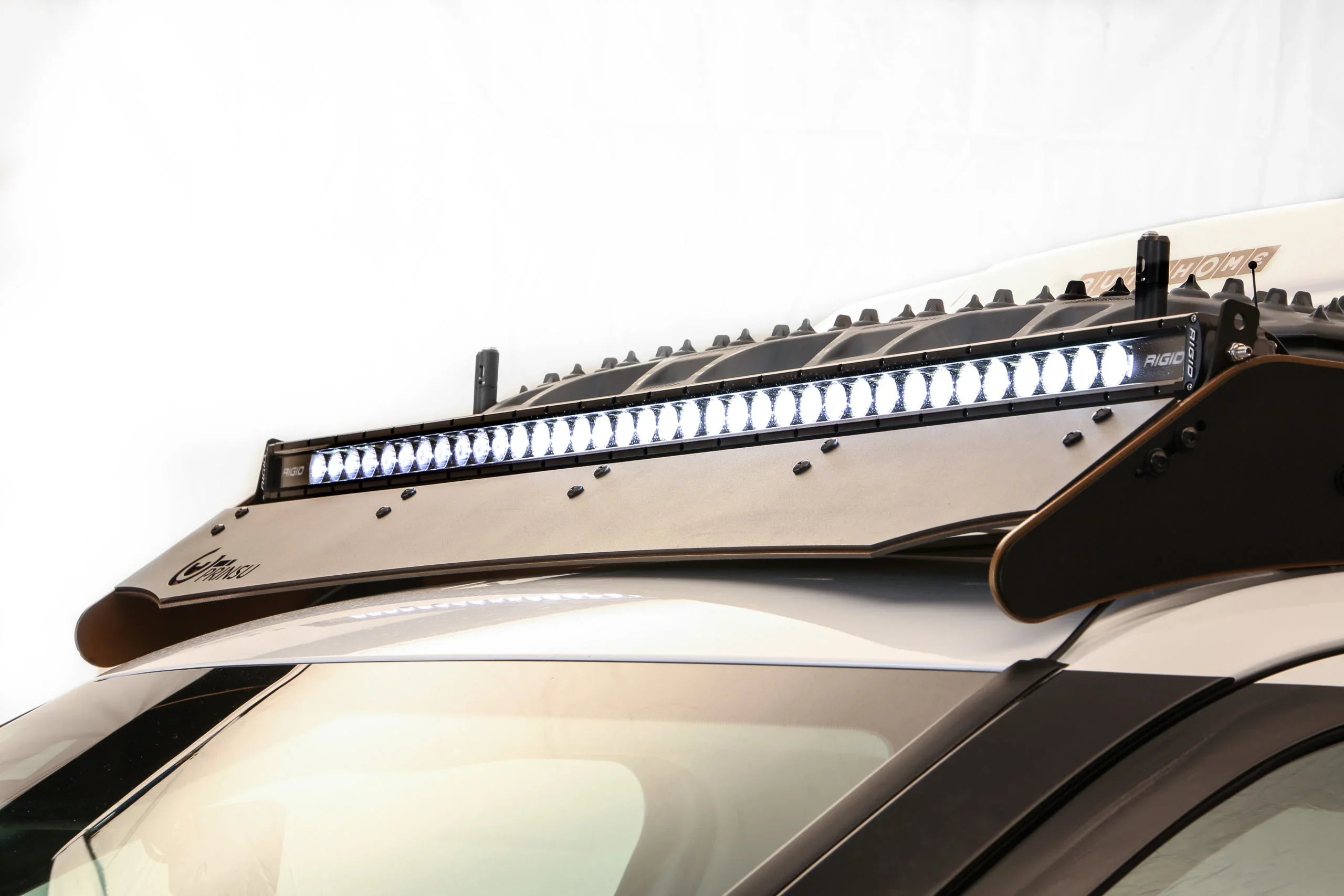 Toyota SUV roof rack with Rigid LED light bar and offroad accessories for overlanding
