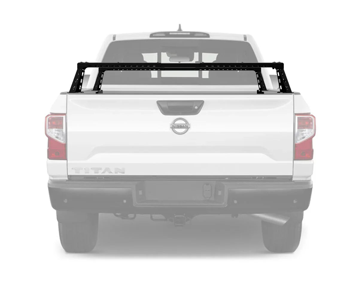 Black bed bars mounted on Nissan Titan truck bed, overlanding accessory