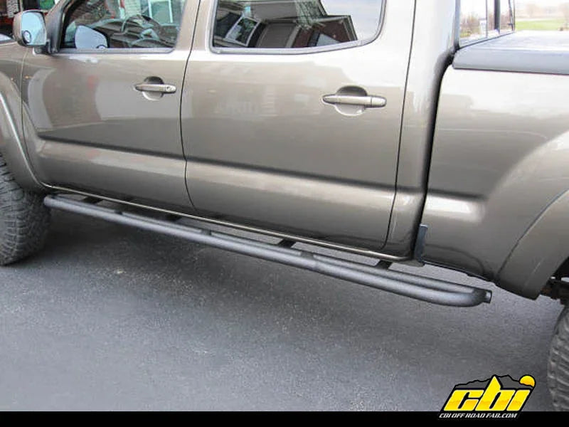 Toyota Tacoma double cab long bed with CBI offroad rock sliders installed