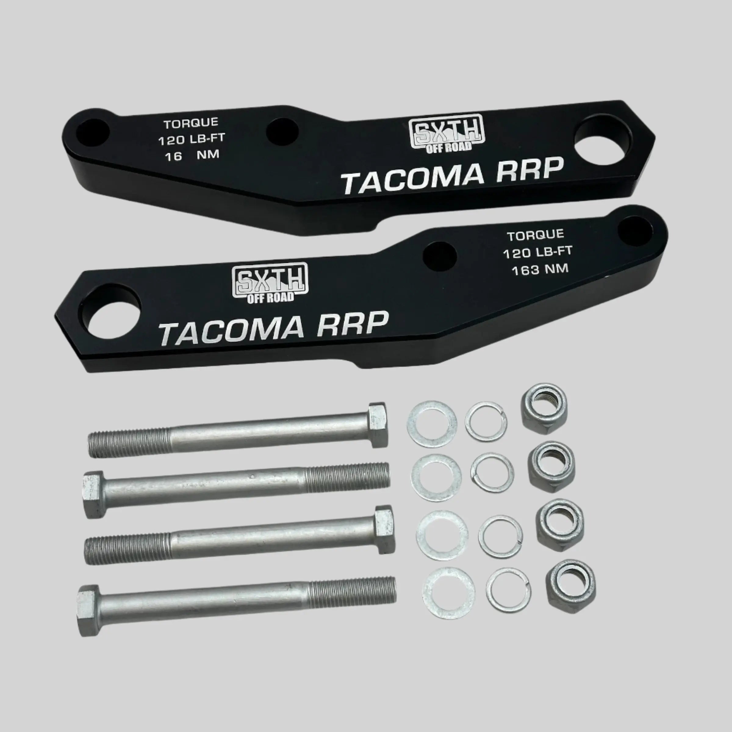 Toyota Tacoma rear recovery points kit with bolts, washers, and nuts on gray background