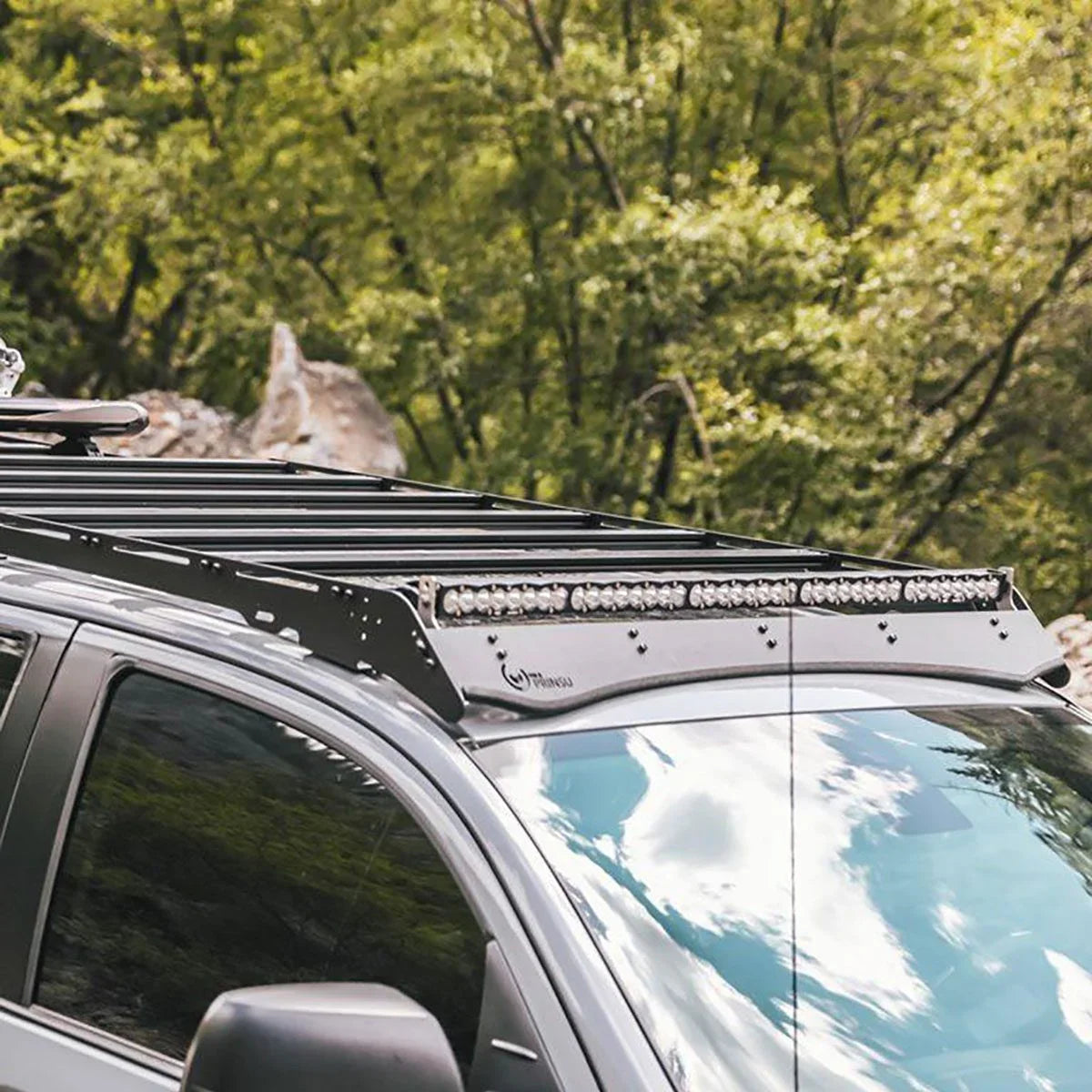 Toyota Tundra CrewMax roof rack and LED light bar in outdoor setting