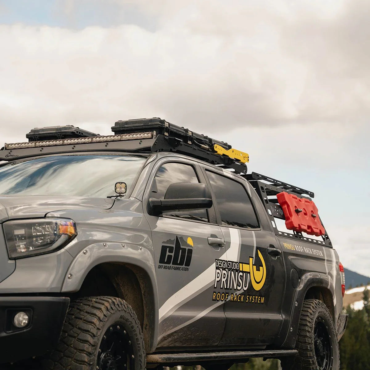 Toyota Tundra CrewMax with Prinsu roof rack system, off-road gear mounted, outdoors