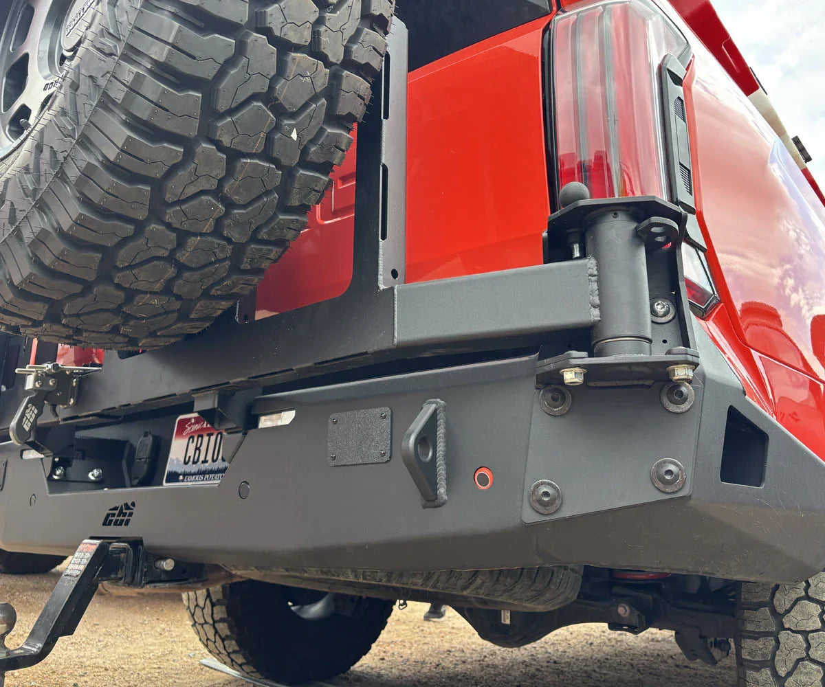 Toyota Tundra rear view with off-road bumper and spare tire mount, overlanding gear
