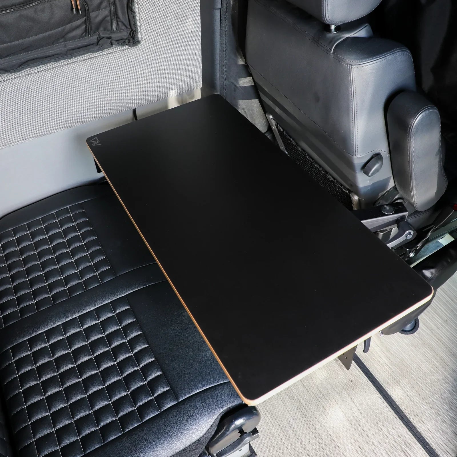 Universal carbon fiber folding table mounted inside vehicle for overlanding or camping
