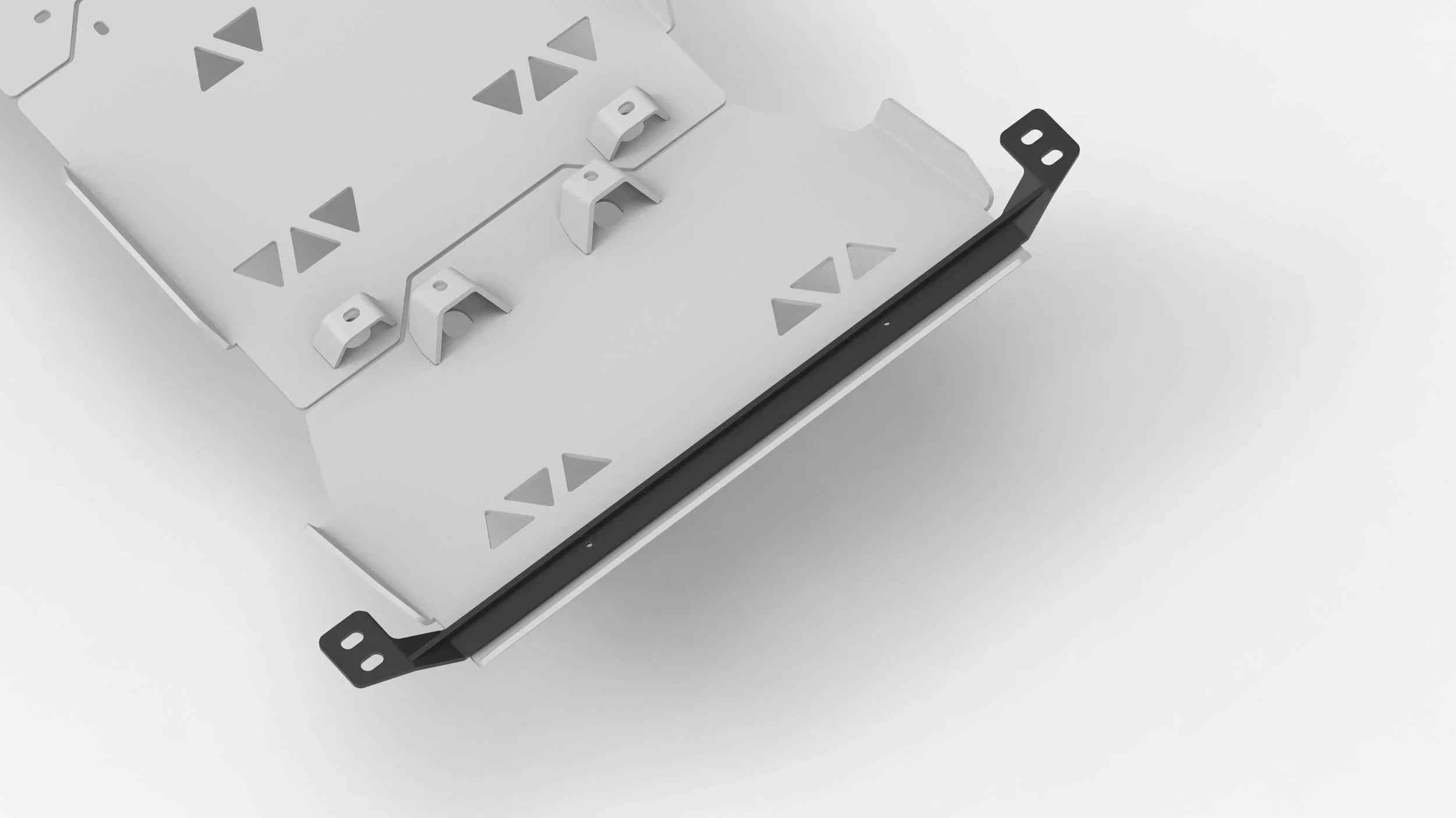 Heavy-duty skid plate with mounting brackets for off-road vehicle protection, close-up view