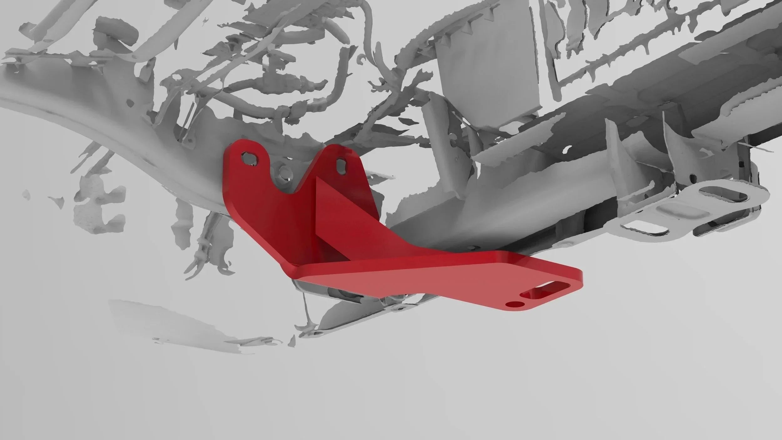 Red steel recovery point bracket mounted to a vehicle chassis for off-road use