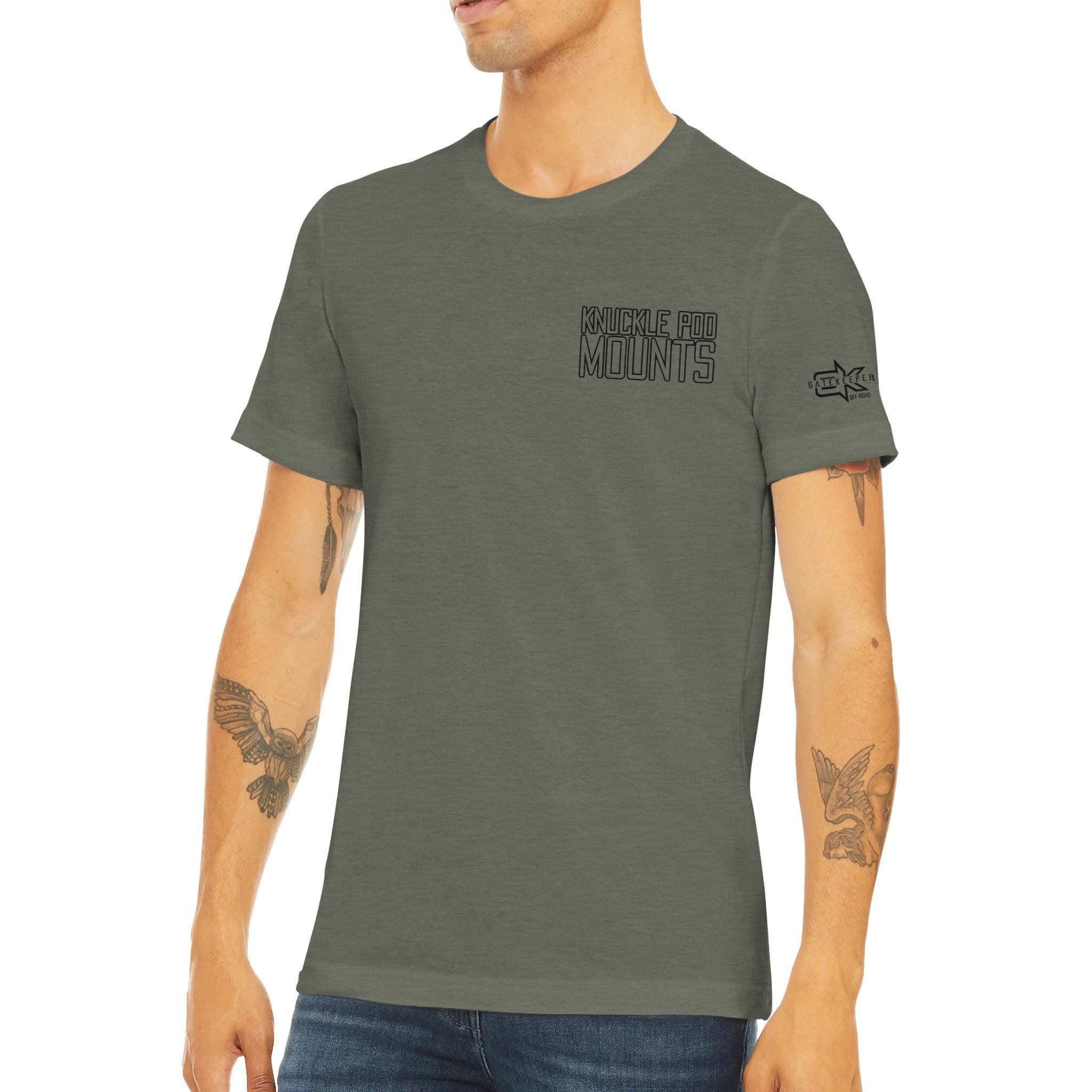 Olive green Knuckle Pod Mounts t-shirt, camping gear themed, worn by tattooed man