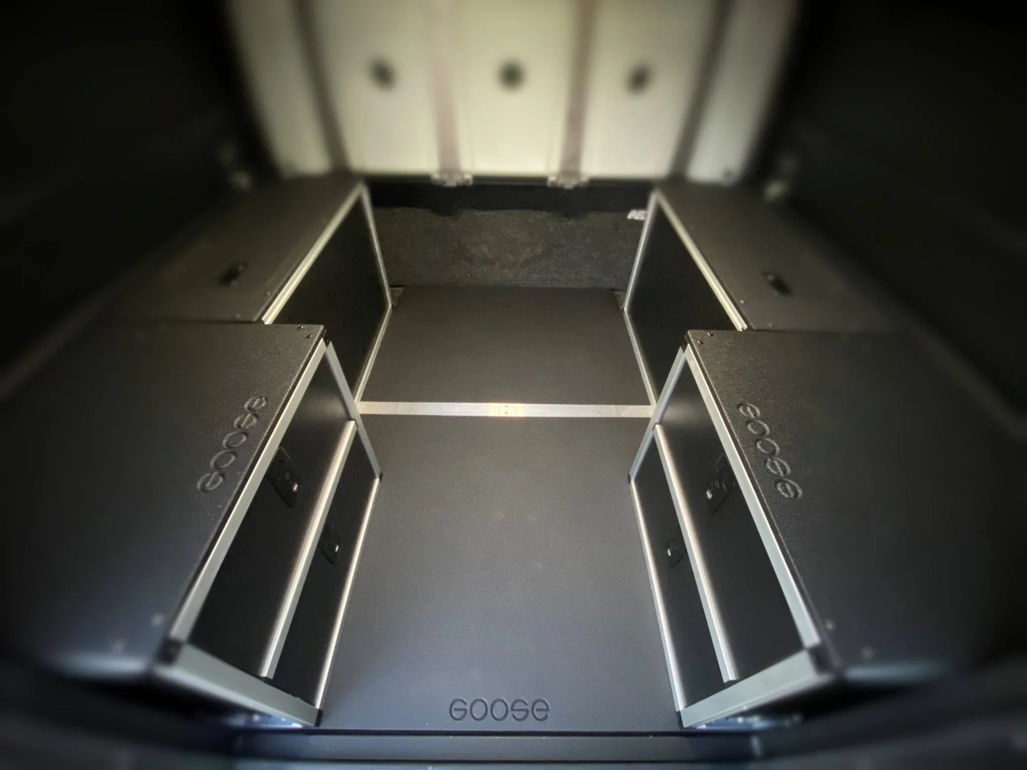 Chevy Colorado GMC Canyon bed plate storage system with black aluminum drawer compartments