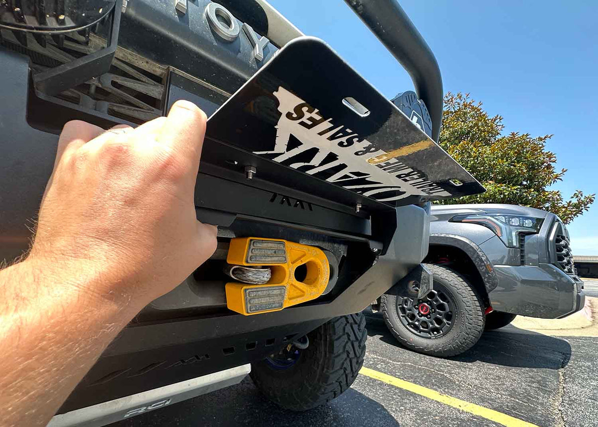 backwoods-front-bumper-flip-up-license-plate-bracket-hawse-fairlead-installed - NVMOS