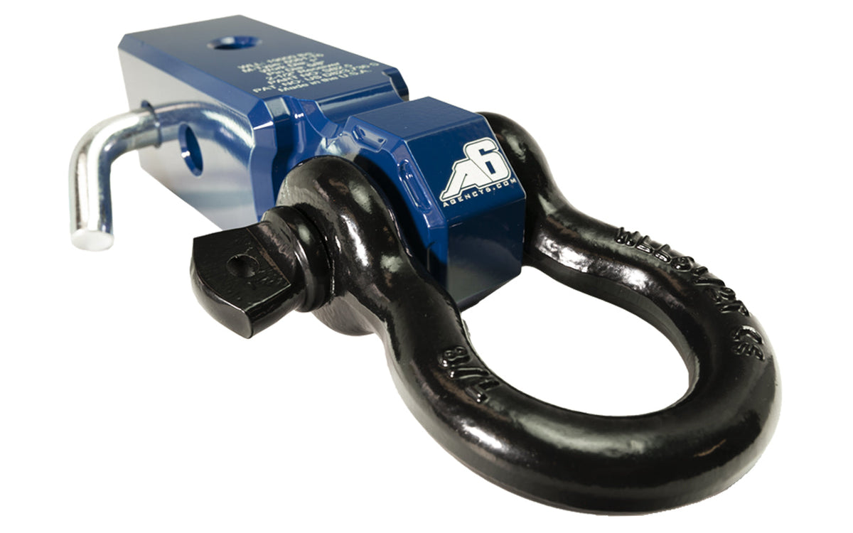 Agency 6 2.5 inch shackle block assembly in blue for universal fit
