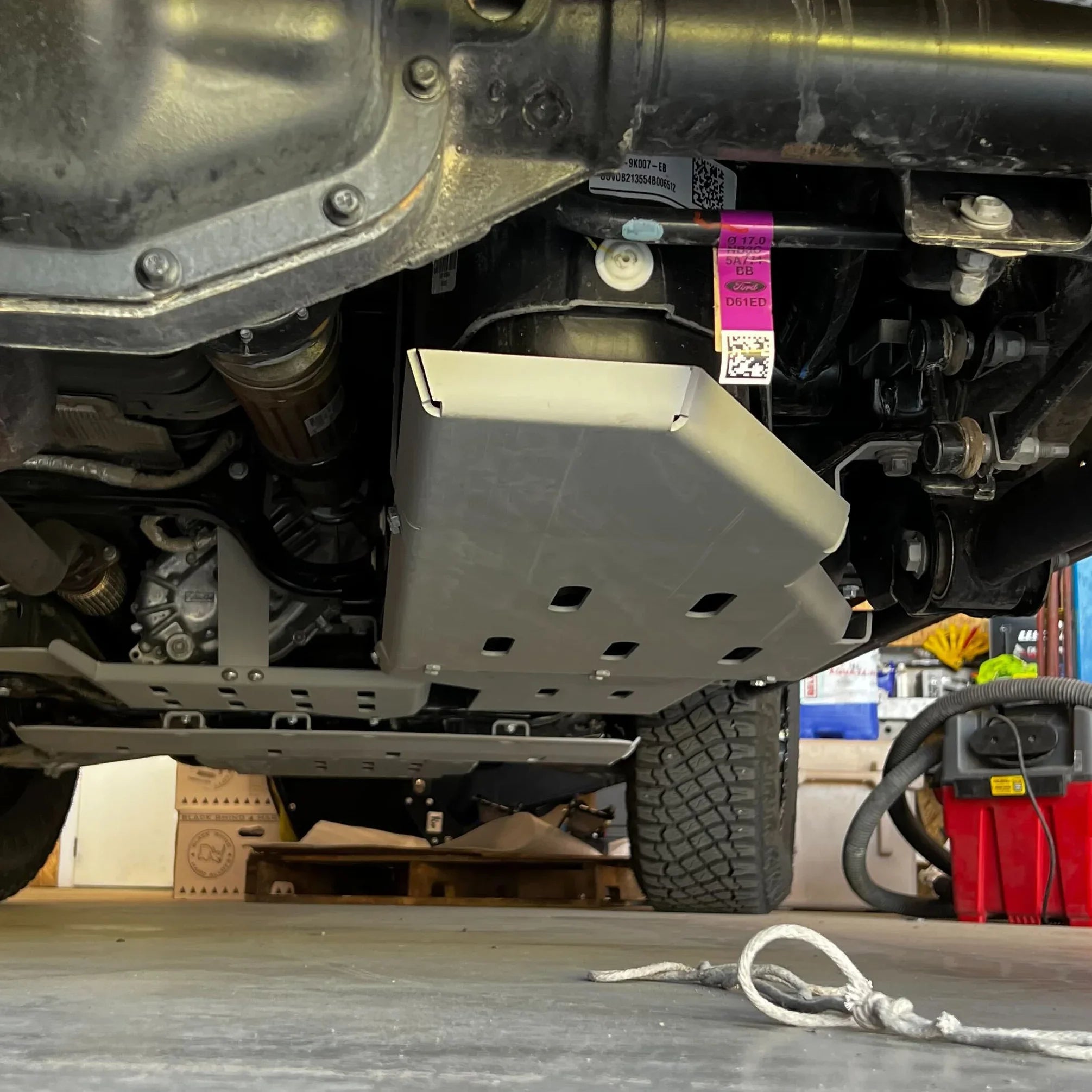 Ford Bronco undercarriage with installed off-road gas tank skid plate for vehicle protection