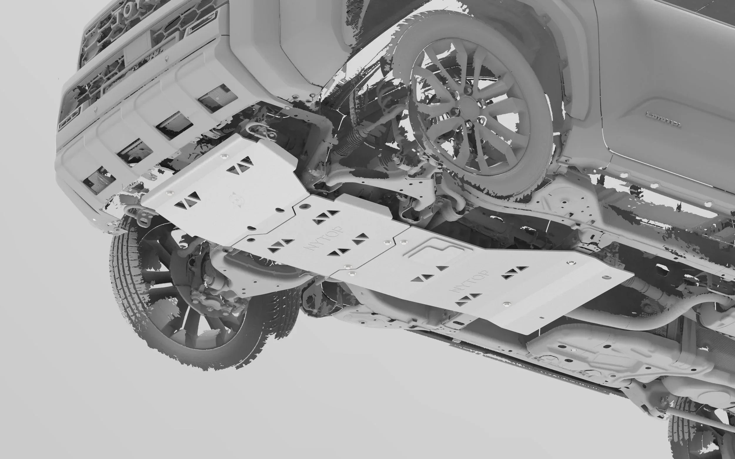Toyota vehicle with aftermarket skid plates and off-road wheels for overlanding protection