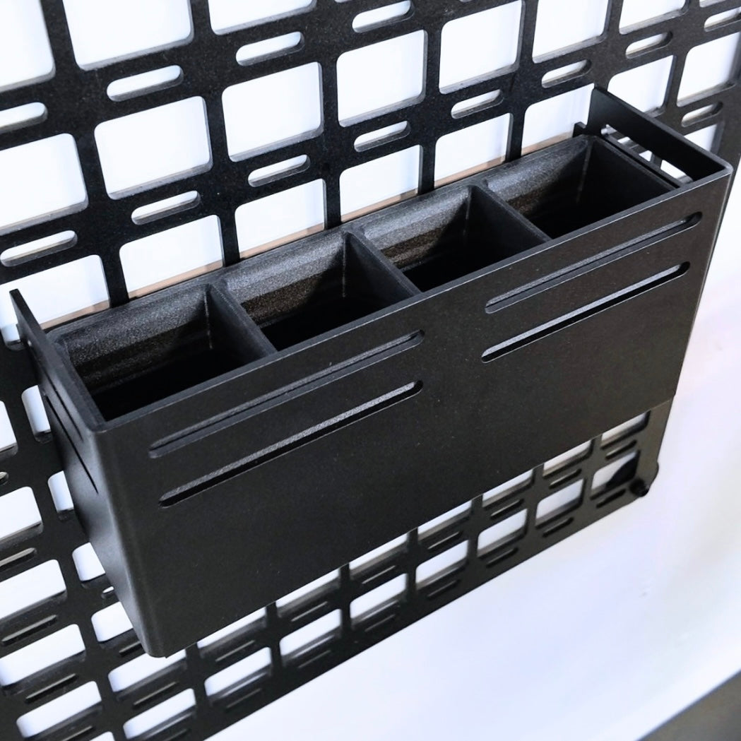 CAV MOLLE Shelf Caddy hooked onto a MOLLE panel