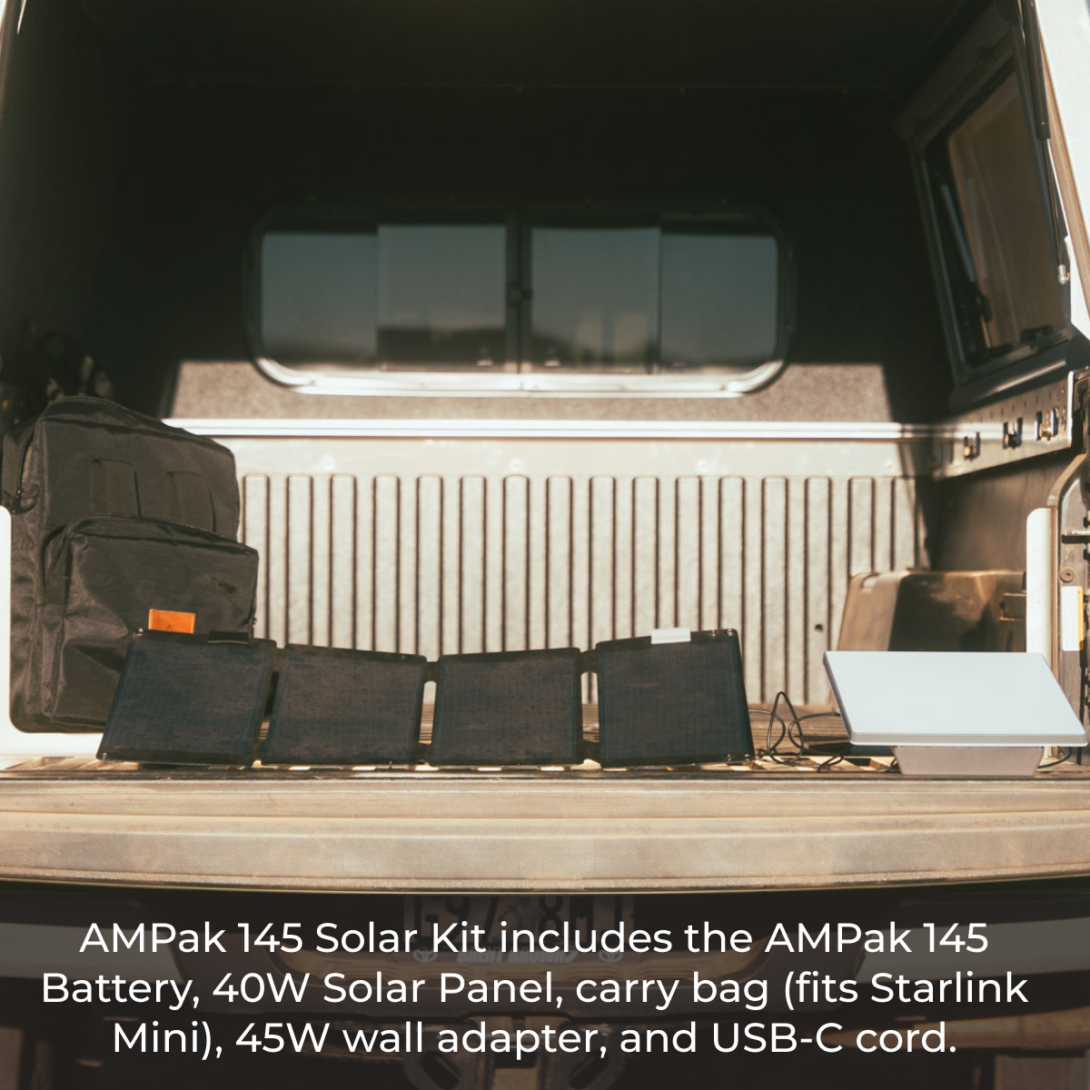 Portable solar kit with 40W solar panel, battery, carry bag, wall adapter, USB-C cord in truck bed