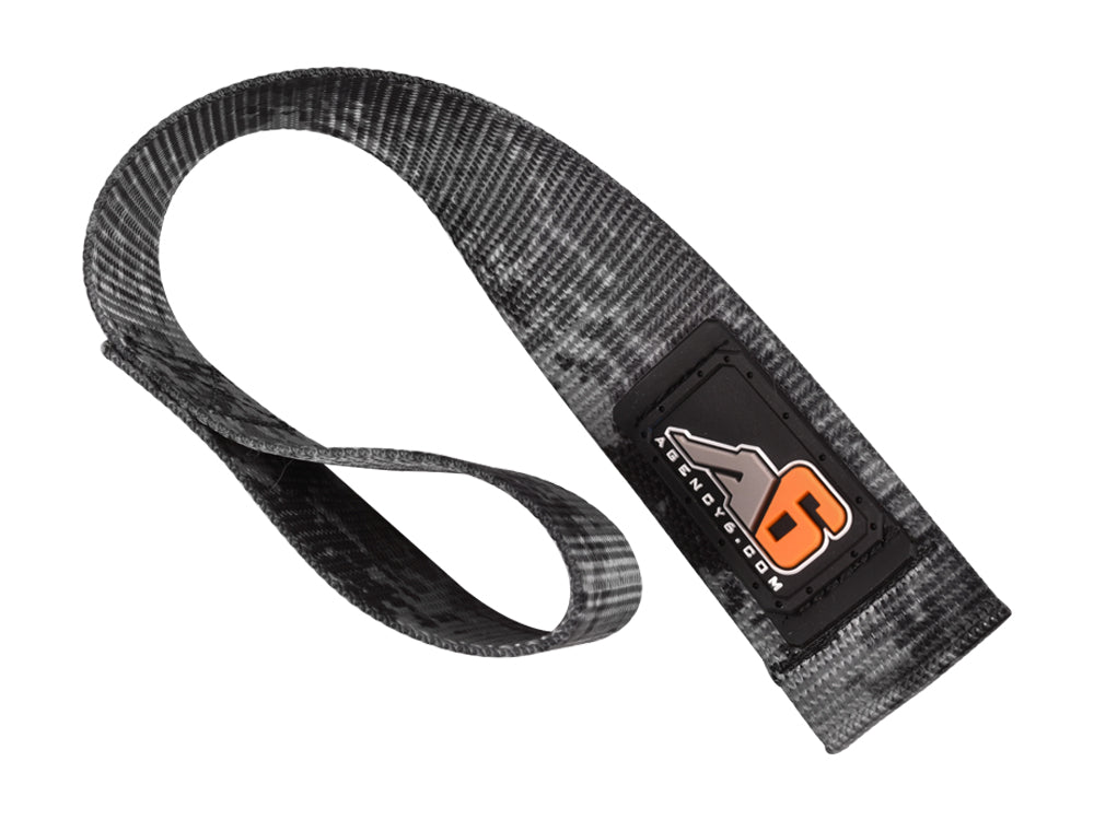 Heavy-duty grey recovery strap with reinforced loop for off-road and overlanding vehicles