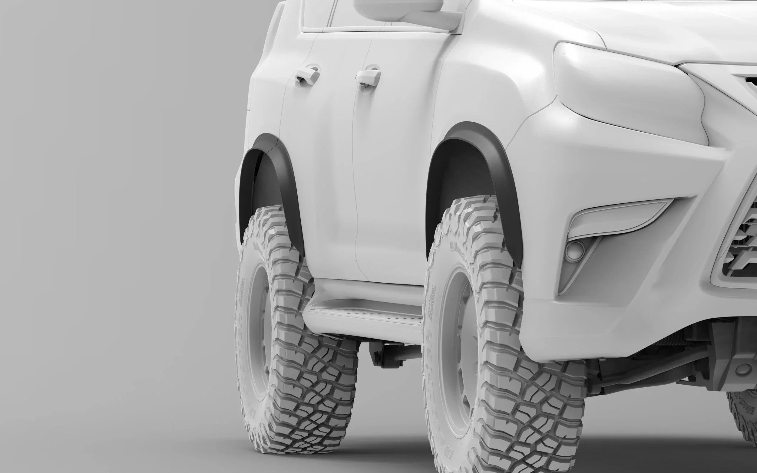 Off-road SUV with lifted suspension and rugged all-terrain tires, gray background