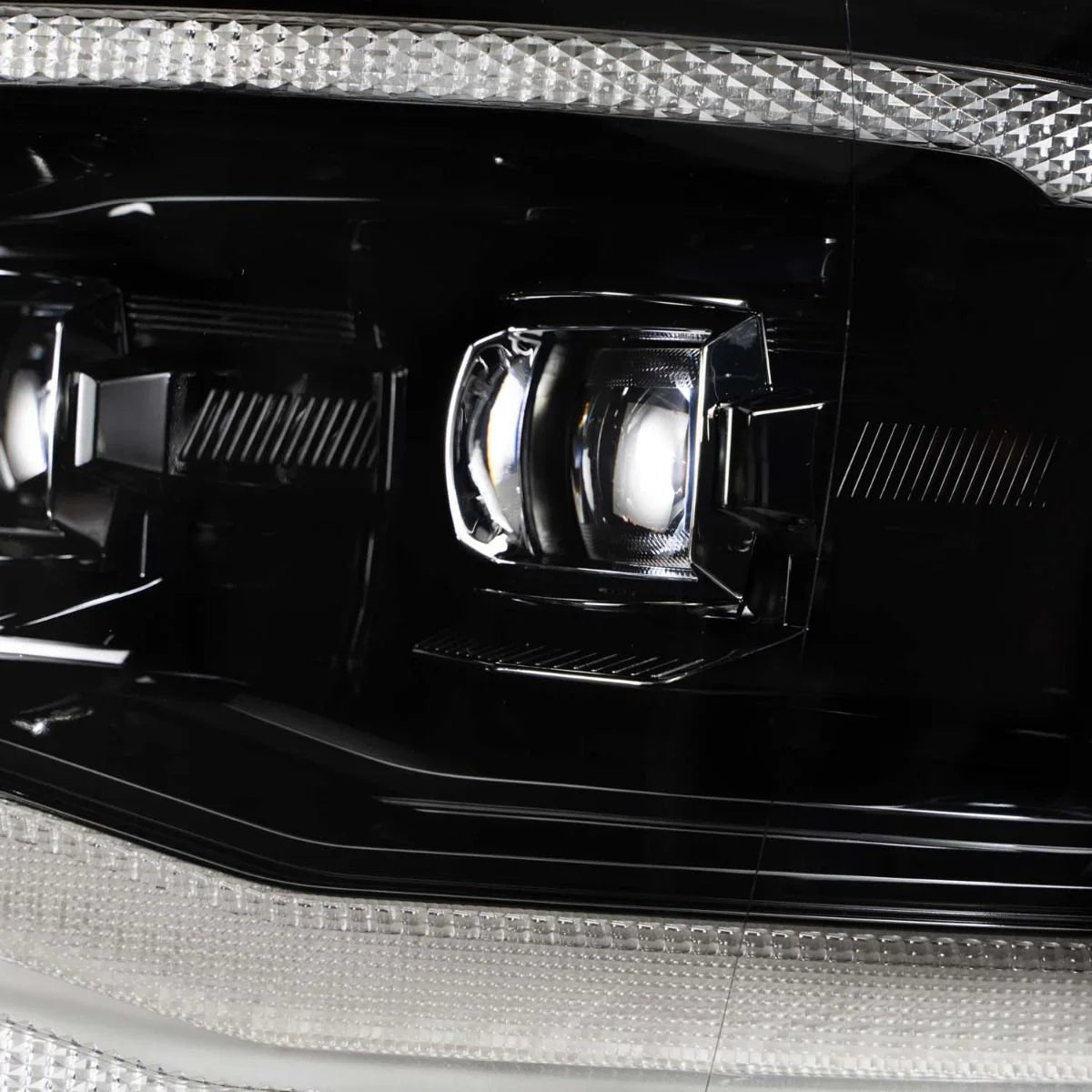 Close-up of RAM 1500 LED headlight and turn signal, modern truck lighting detail