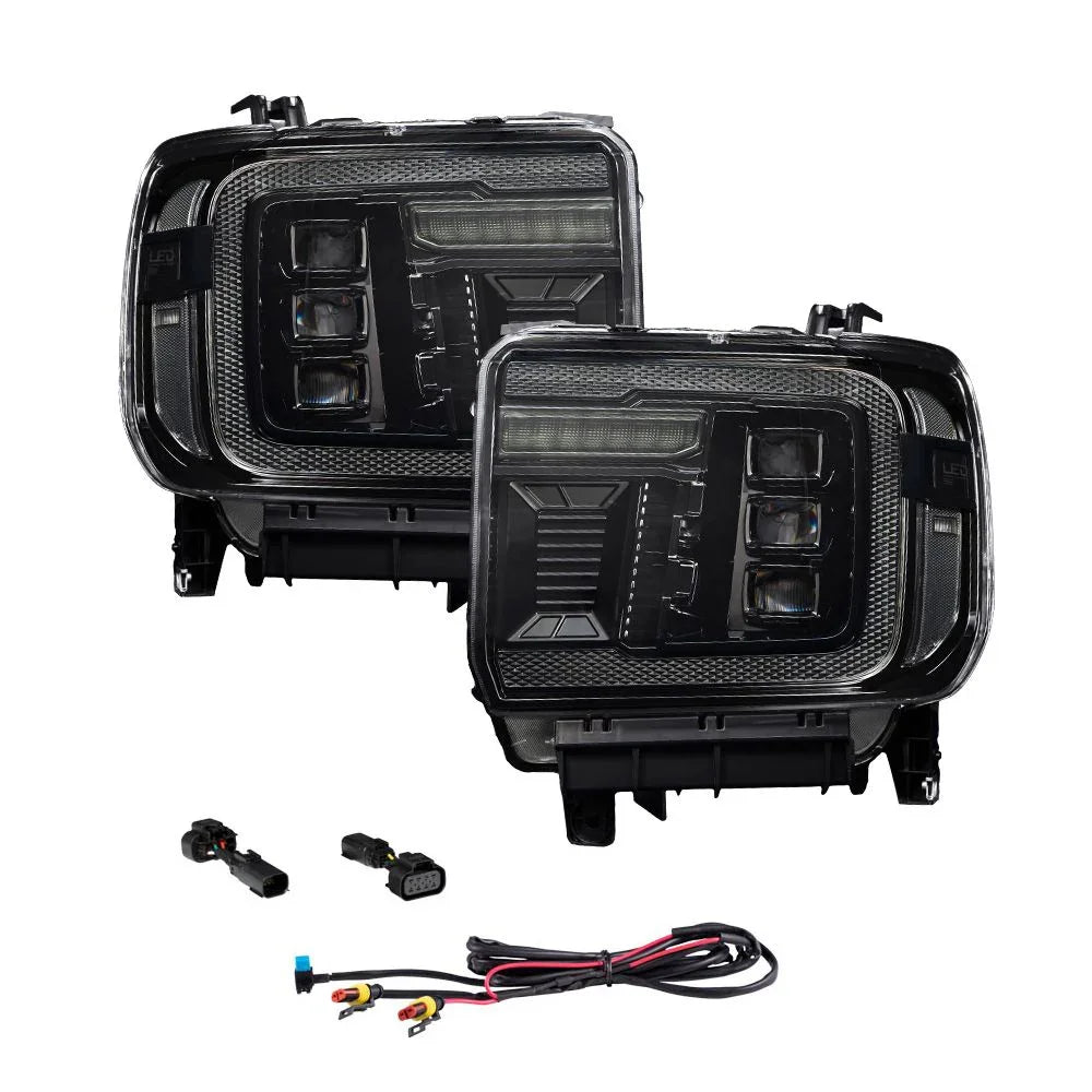 Pair of LED headlights for GMC Sierra with wiring and connectors, black housing