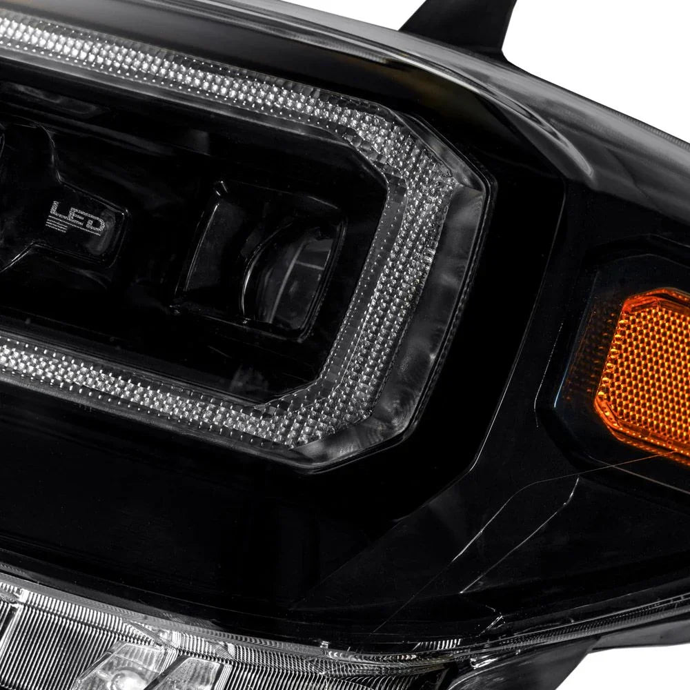 Close-up of Tacoma LED headlamp with dual color DRL and amber reflector