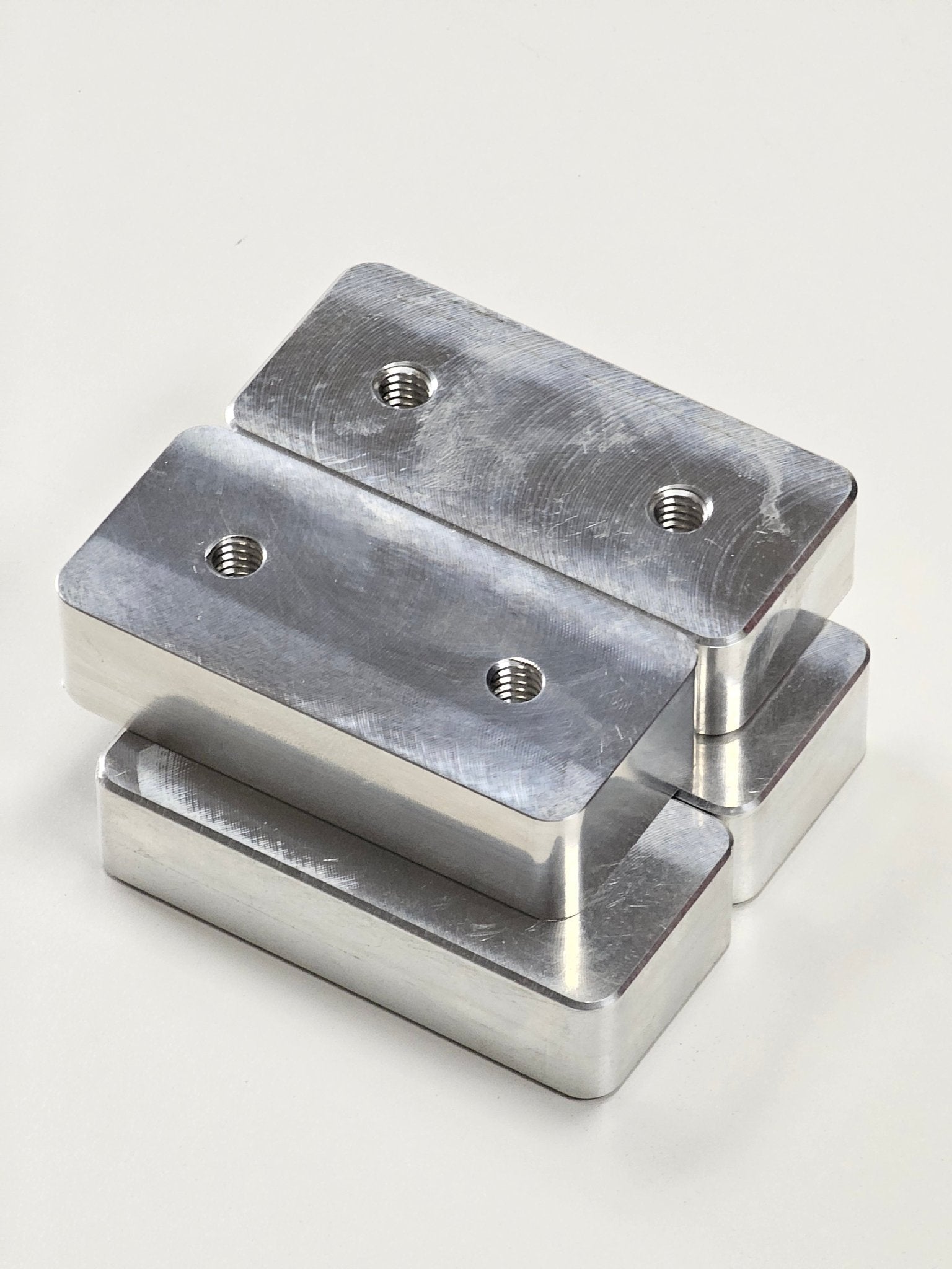 Aluminum bed rail filler pucks for 2024 Ford Ranger, threaded mounting holes, on white background