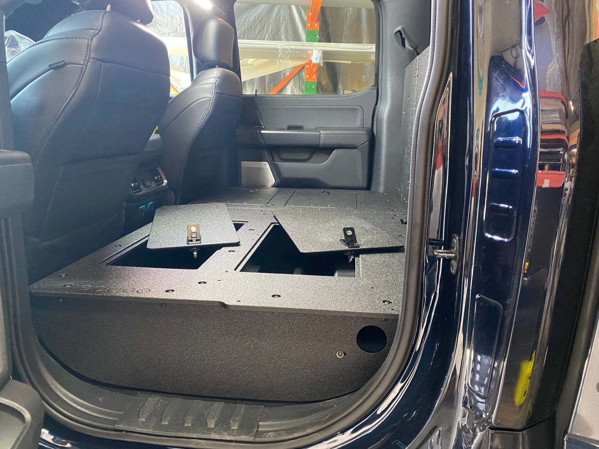 Goose Gear Ford Super Duty Ford - F250-F350 - 2023-Present - 5th Gen. Crew Cab - Second Row Seat Delete Plate System with Factory B&O Subwoofer Center Wall with Exterior Port