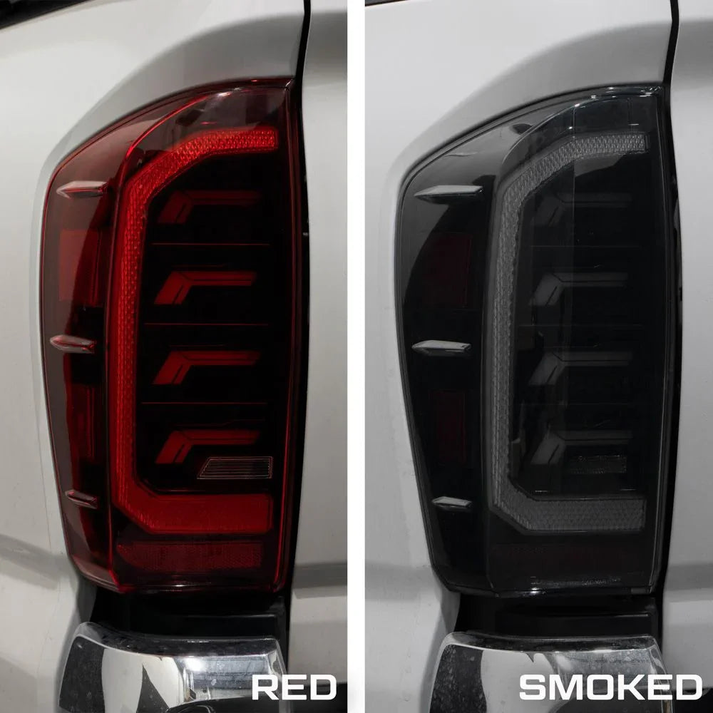 2018 Toyota Tacoma red vs smoked tail light comparison on white truck