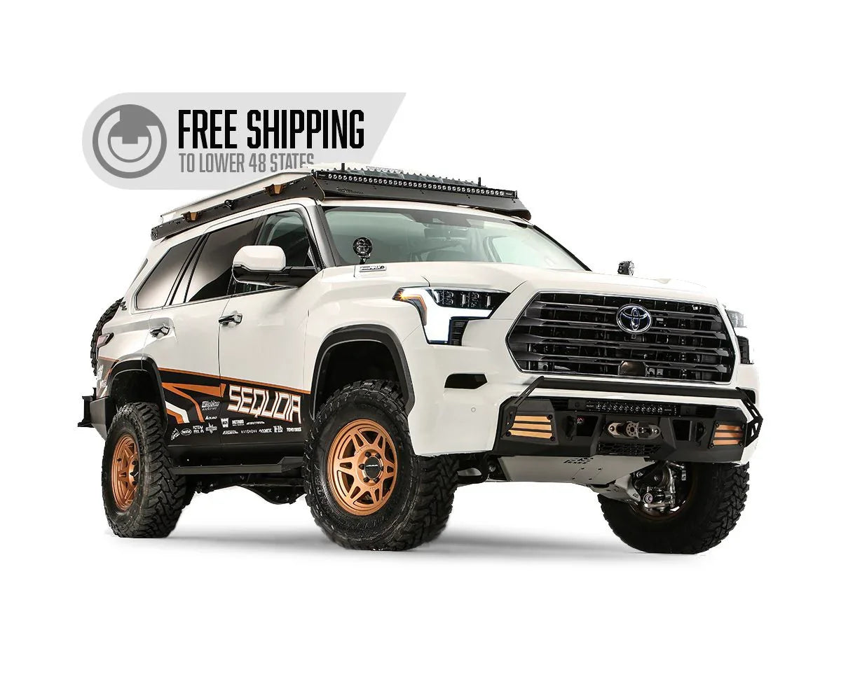 White Toyota Sequoia overland SUV with off-road accessories, roof rack, custom wheels