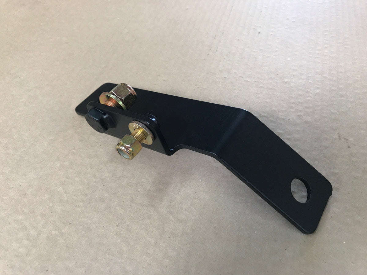 Goose Gear 60 percent seat delete bracket for a 2007-2018 Jeep Wrangler JKU, black bent steel with brass bolts