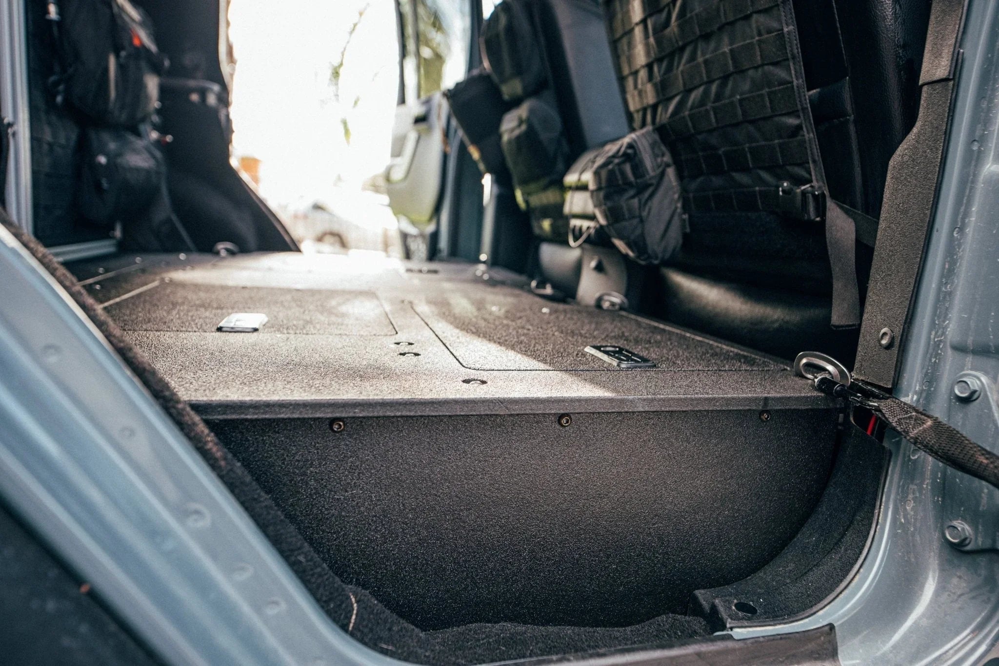 Jeep Wrangler 4-door second row seat delete plate system with infill panels installed