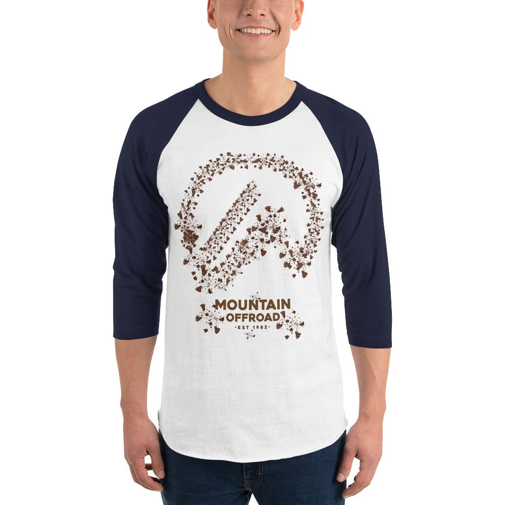 Man wearing white and navy raglan shirt with Mountain Offroad graphic and text on front