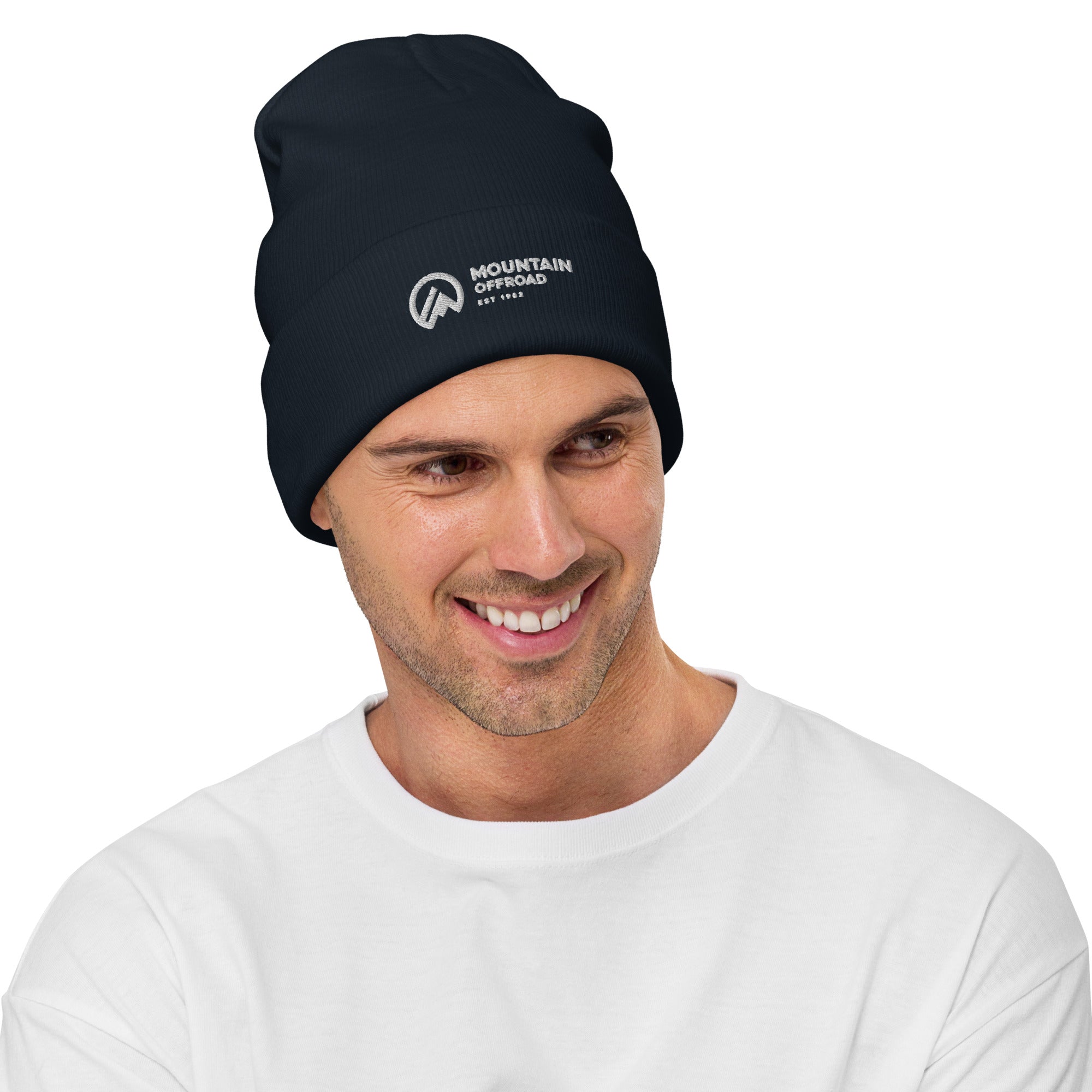 Smiling man wearing a black Mountain Offroad beanie, ideal for outdoor adventure gear