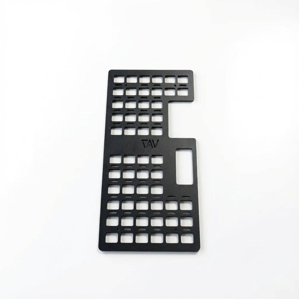 Black modular metal cargo molle panel for overlanding vehicle storage, isolated on white background