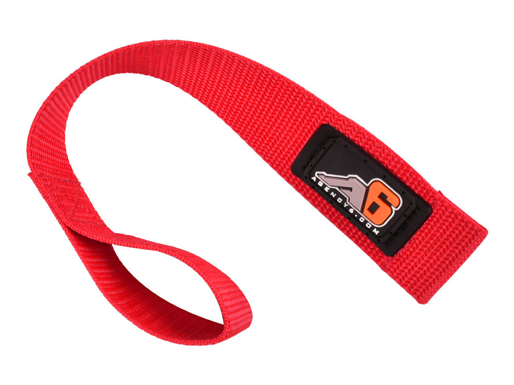 Red nylon vehicle recovery grab handle with black logo patch for off-road trucks and SUVs