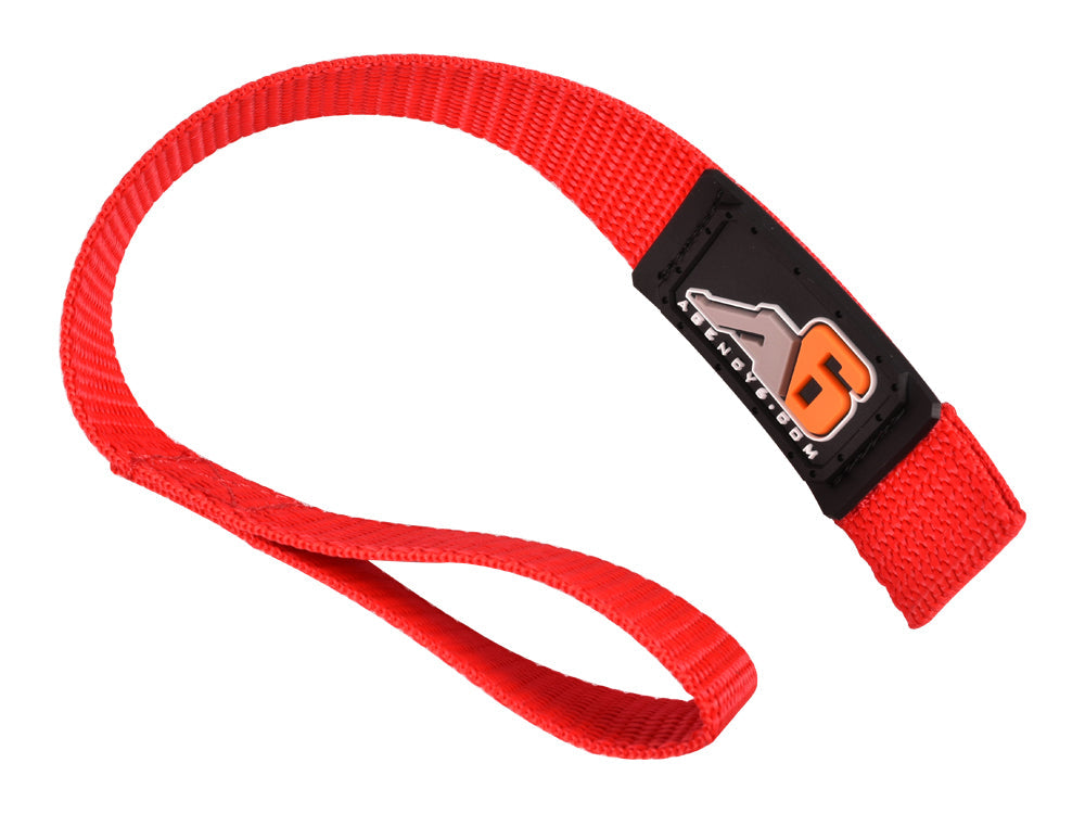 Red nylon recovery strap with reinforced stitching and logo, off-road vehicle accessory