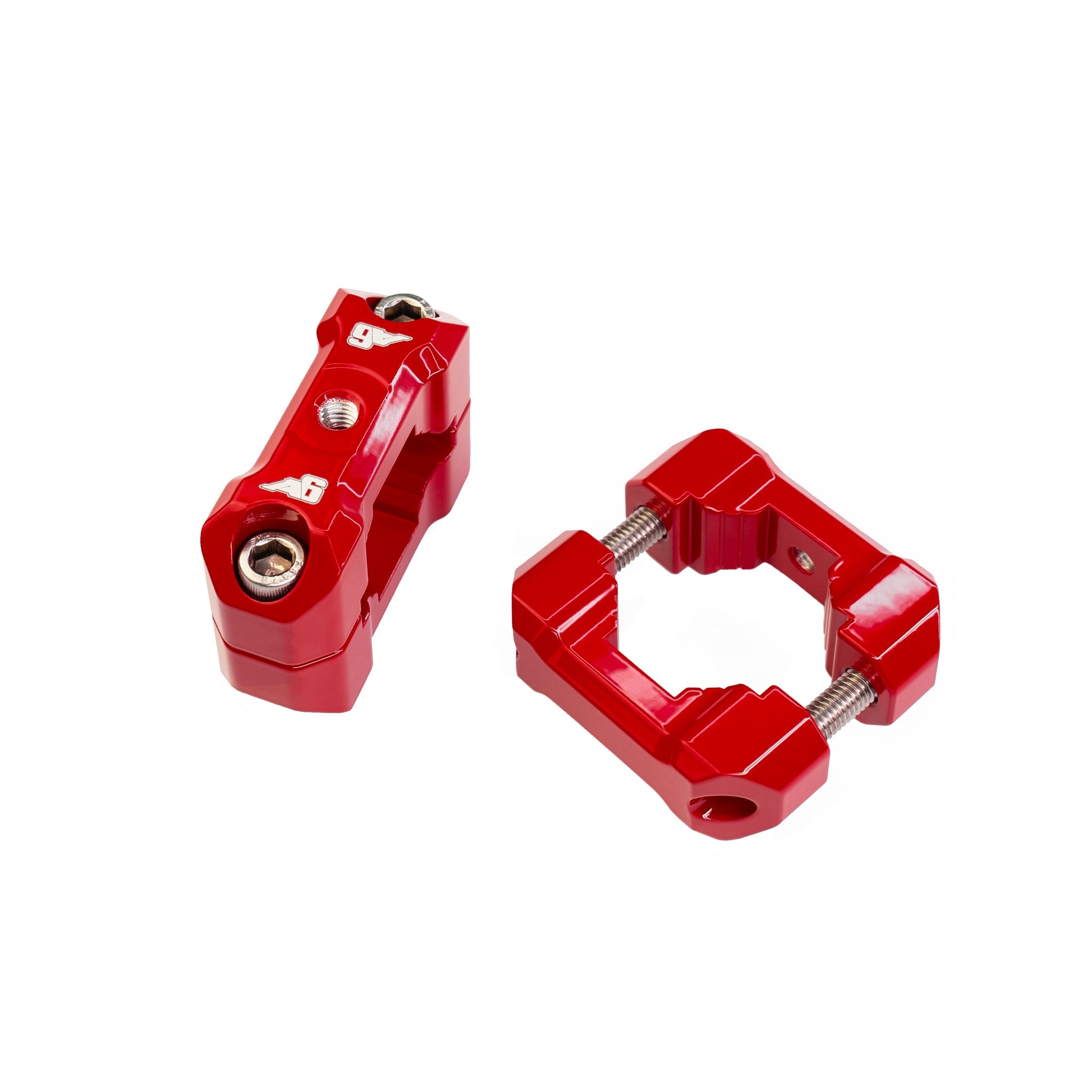 Red aluminum mounting brackets for overlanding vehicle accessories on white background
