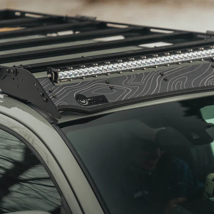 Toyota roof rack with topographic print and LED light bar for overlanding vehicles