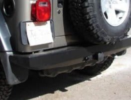 Rock Proof rear bumper with clevis mounts on Jeep Wrangler YJ, rugged off-road accessory