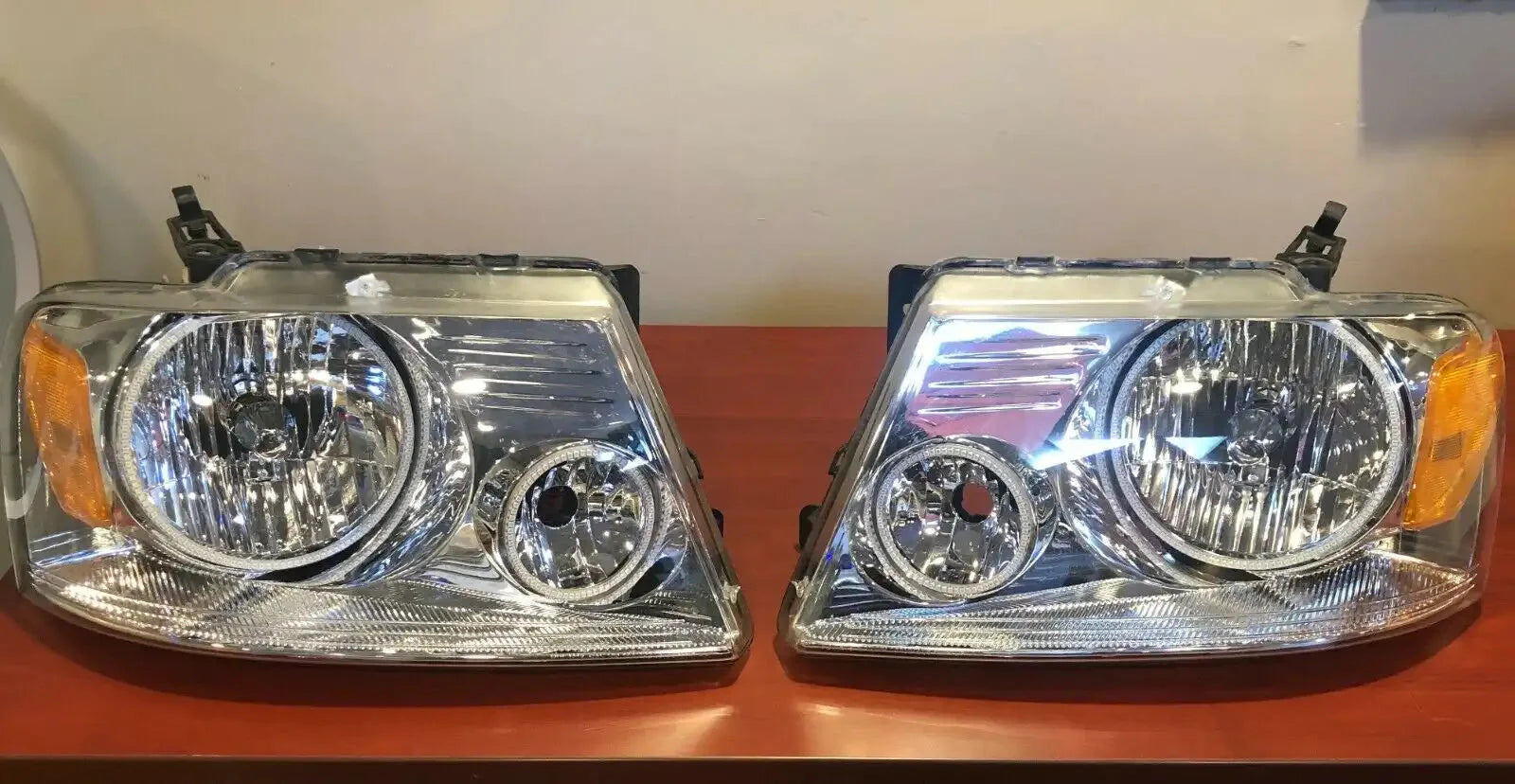 USED 2005-2008 FORD F-150 PRE-ASSEMBLED HEADLIGHTS- CHROME - AMBER 7043-005 - CLEARANCE