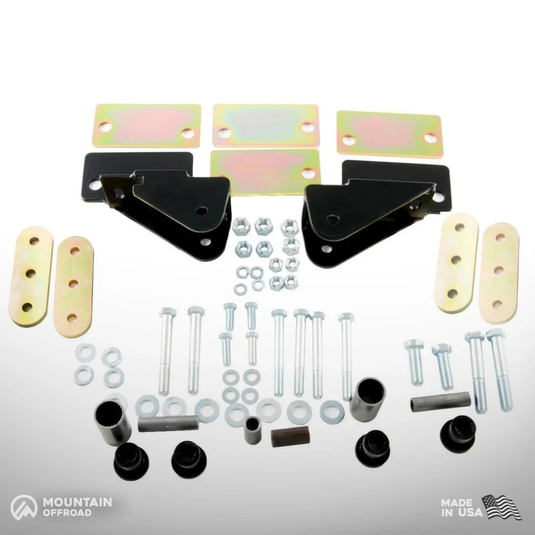 Shackle reversal system hardware kit for Jeep CJ 1976-86 with YJ springs, includes brackets, bolts, bushings, and mounting plates.