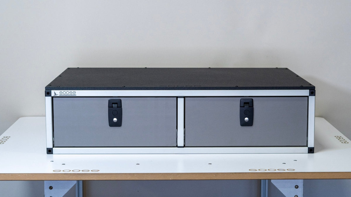 Goose Gear side by side drawer module, 41 3/8 inch wide, with two gray drawer faces and black latches on a workbench