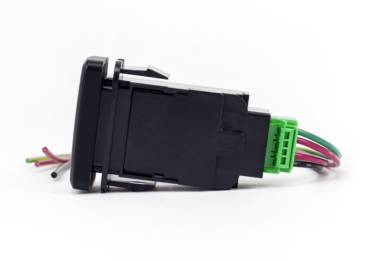 Automotive rocker switch with green wiring harness for Toyota or Jeep overland vehicles