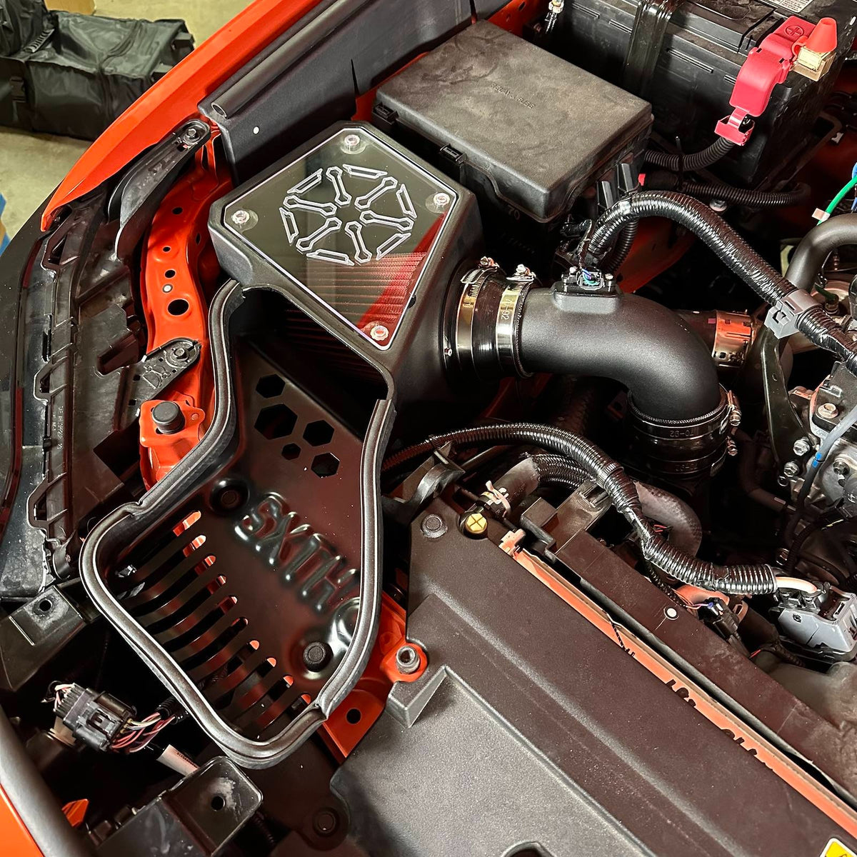 SXTH Element CPLT airbox installed in the engine bay of a 2024+ Toyota Tacoma 2.4T