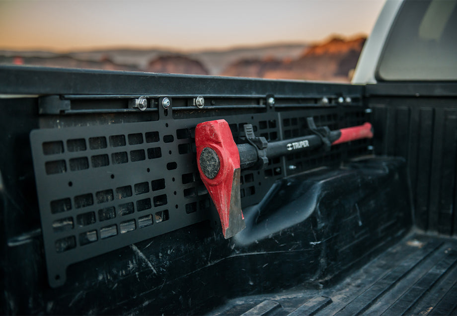 Truck bed molle panel mounting red-handled axe, overland storage accessory for Toyota Tacoma