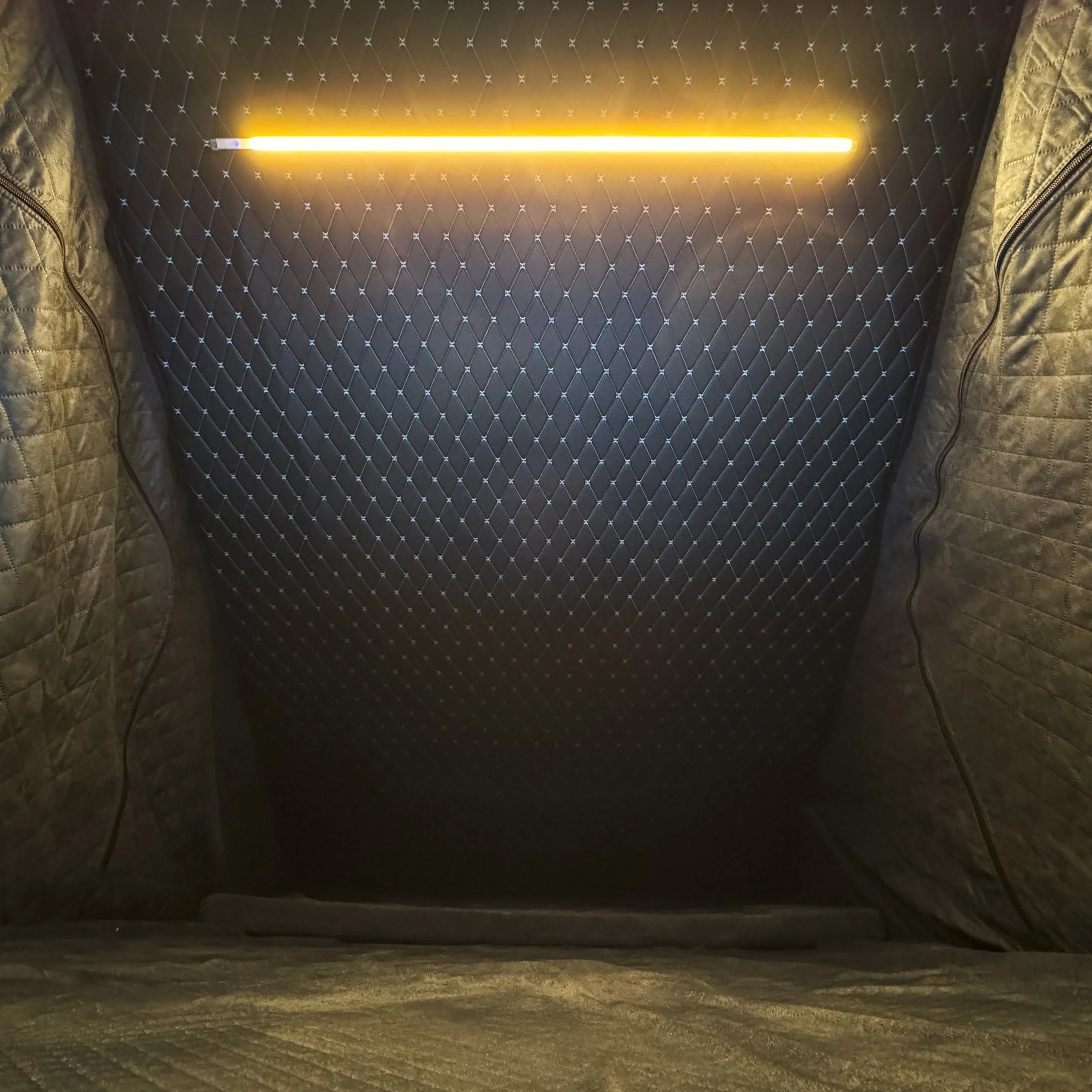 Quilted thermal liner interior for overland canopy with LED strip light, camping accessory