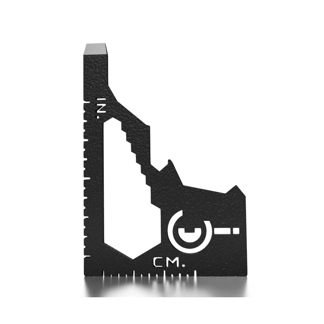 Black aluminum multi-tool ruler with inch and centimeter markings for overlanding vehicles
