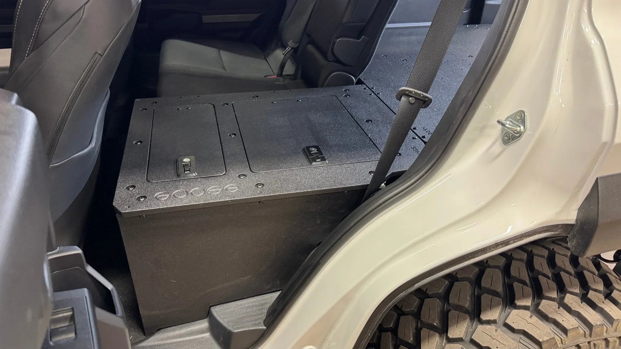 Toyota 4Runner 2025 rear seat delete kit with plate-based storage, overland interior view