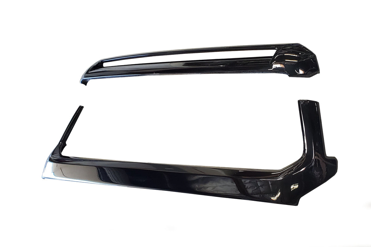 Ecoological gloss black grille surround and hood bulge overlay pieces for the 2014-2021 Toyota Tundra, laid out on white