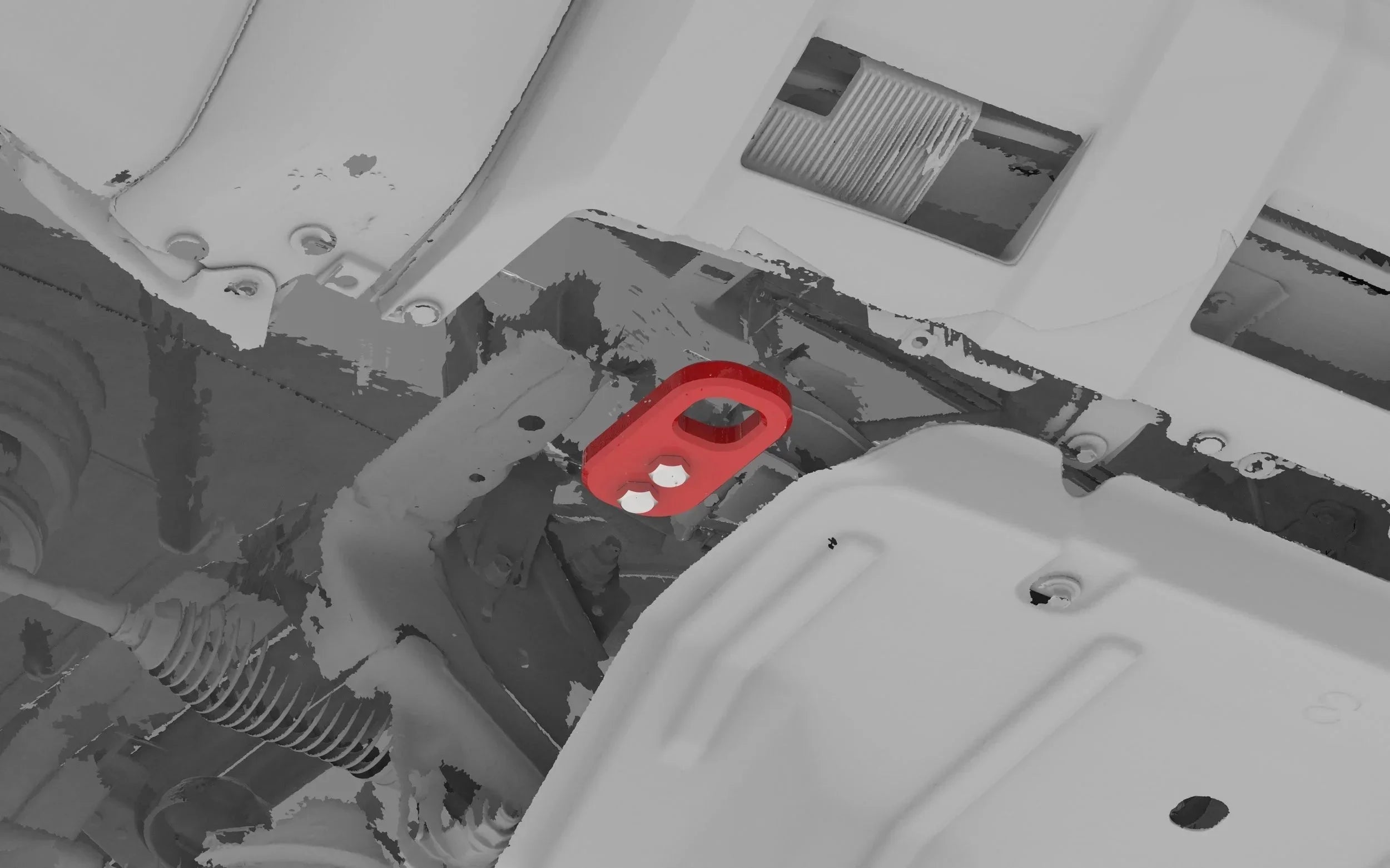 Red recovery point mounted on vehicle undercarriage for off-road and overlanding use