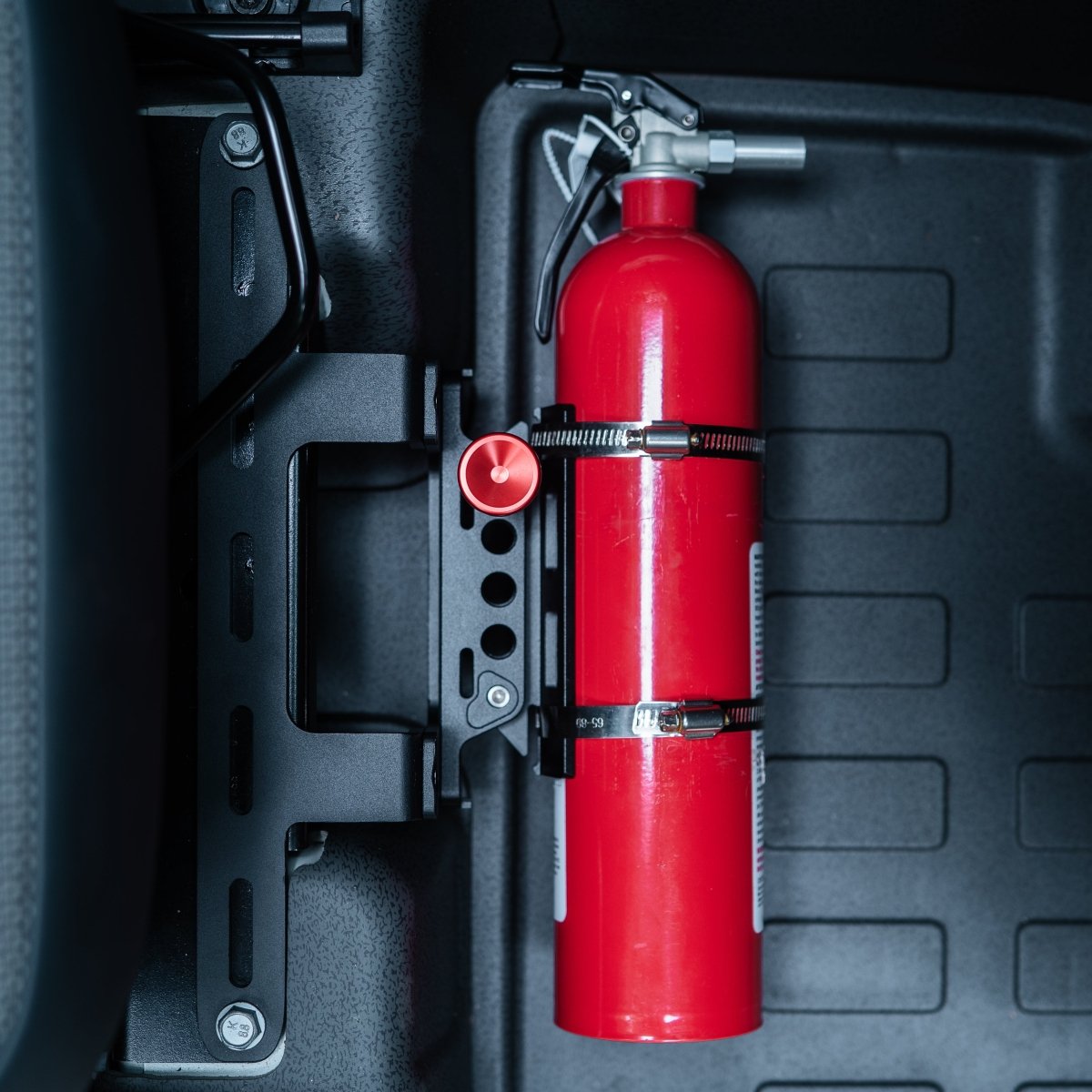 under-seat-fire-extinguisher-mount-for-ineos-grenadier-4093882 - NVMOS
